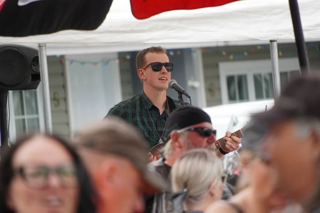 Conrad Daniel performing live at an outdoor event